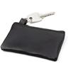 Leather key wallet with metal ring and zipper.